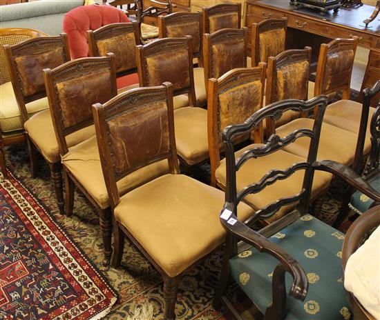 Set of 12 oak late Victorian dining chairs, leather-upholstered